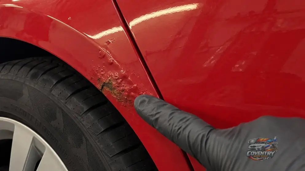 Why is my car paint bubbling, and does it mean rust?